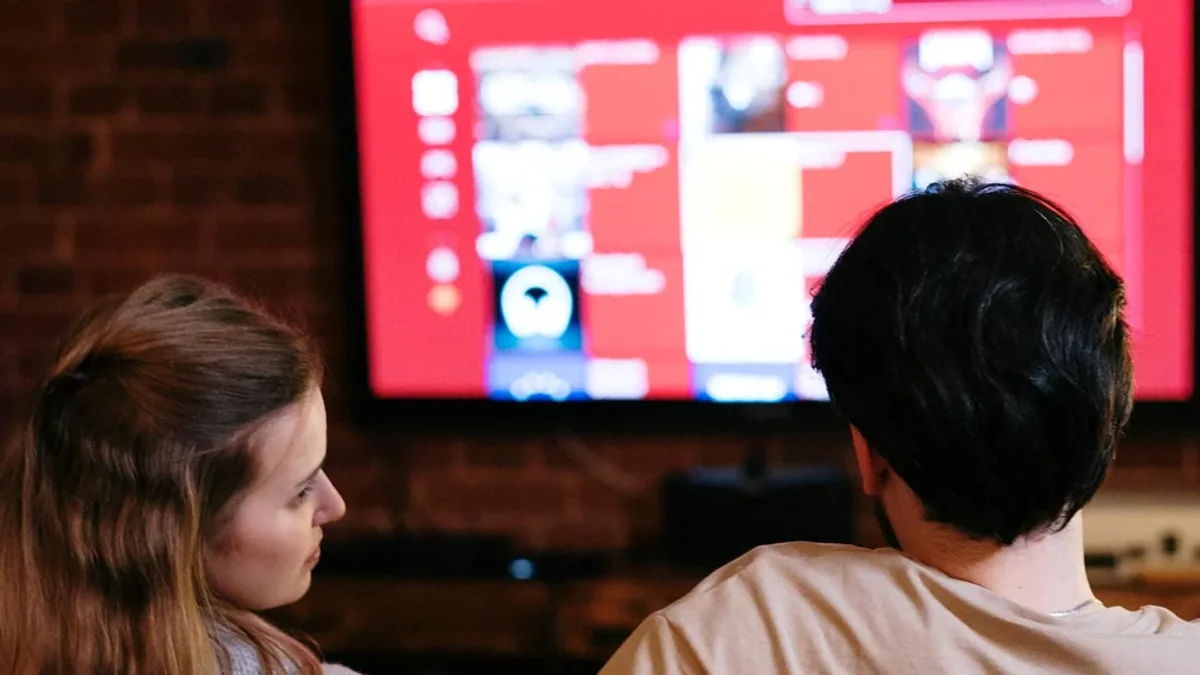 A Firestick plugged into the back of a smart telly