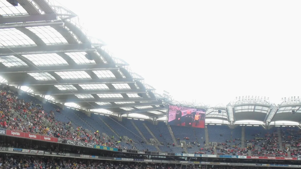 A floodlit stadium packed for a championship night