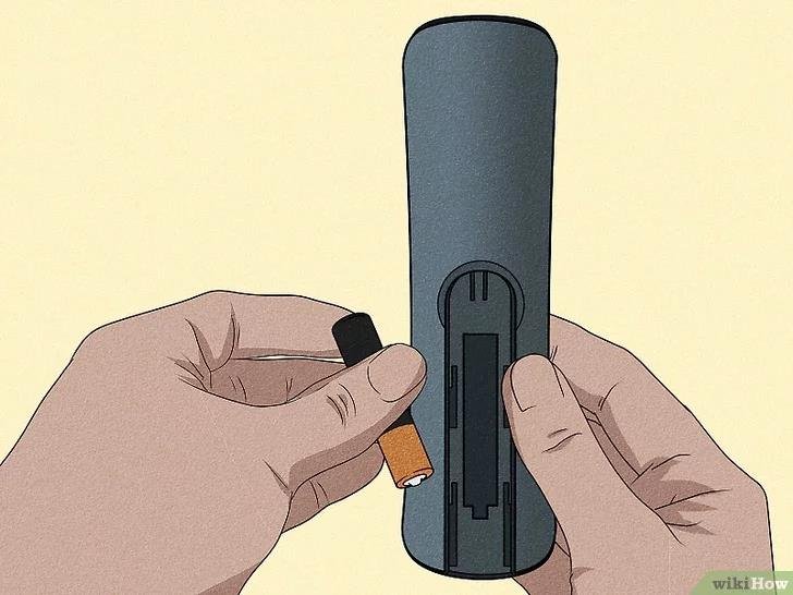 Insert batteries into the Android TV box's remote.